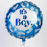 Blue foil balloon with white footprints and the words "It's a Boy!"