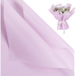 Small bouquet of pink and white flowers wrapped in lavender paper