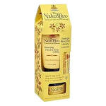 Yellow gift box with Naked Bee hand and body lotion and lip balm