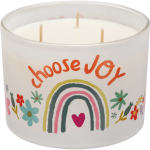 White candle in a glass jar with colorful rainbow and flower design