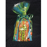Wrapped gift bag of assorted candy bars tied with curling ribbons