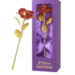 Single red rose in a purple gift box with gold leaves