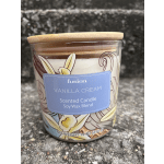 Vanilla cream scented candle in a glass jar with a wooden lid