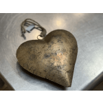 Metal heart ornament with a hanging cord
