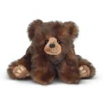 Brown plush teddy bear sitting on a white background