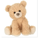 Tan teddy bear plush toy sitting upright