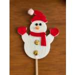 Snowman decoration with red hat, scarf, and mittens on a stick