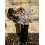 Birthday balloons in a black vase with a "Congrats" star balloon