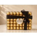 Box of Ferrero Rocher chocolates tied with a black ribbon