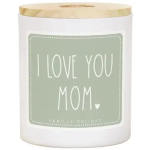 White candle in a glass jar with a gold lid and "I LOVE YOU MOM" label