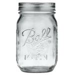 Clear glass mason jar with a metal lid