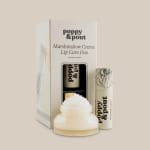 Lip care duo in cream packaging with a balm jar and tube
