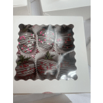 Box of chocolate-covered strawberries with pink and white heart sprinkles