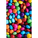 Close-up of assorted colorful candy-coated chocolates filling the frame