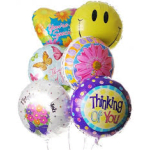Cluster of colorful foil balloons with smiley and floral designs