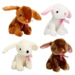 Four plush bunny toys in brown and white with pink ribbons