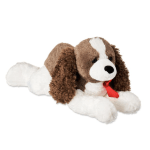 Plush brown-and-white dog with a red ribbon