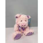 Pink plush pig with purple ribbon and glittery purple feet