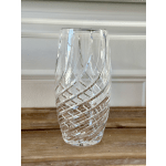 Clear glass vase with a spiral cut pattern