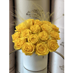 Yellow rose bouquet in a white round box