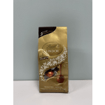 A gold bag of Lindt Lindor assorted chocolate truffles