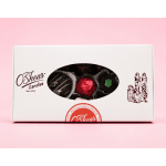 Box of assorted chocolates with a window showing wrapped candies