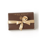 Box of chocolates tied with a gold ribbon