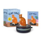 Cat-shaped desktop vacuum with packaging and a mini book