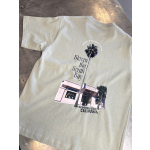 Light green T-shirt with a floral shop graphic and palm tree print