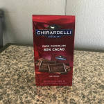 Ghirardelli dark chocolate squares bag standing on a countertop