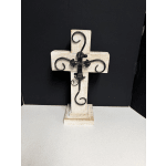 Decorative wooden cross with black metal scrollwork