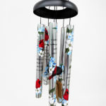 Hanging metal wind chime with cardinal and flower designs