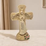 Decorative angel memorial cross figurine with roses and an inscription