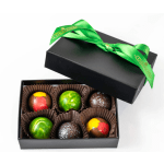 Box of assorted chocolates with a green ribbon