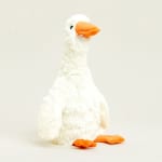 White plush duck with an orange beak and feet on a plain background