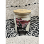 Scented candle in a glass jar with a bamboo lid