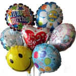 Cluster of colorful birthday and get well balloons with a smiley face balloon