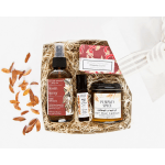 Gift basket with soap, room spray, oil roll-on, and a candle
