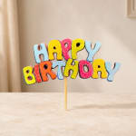 Colorful "Happy Birthday" cake topper on a stick