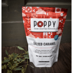 Bag of salted caramel popcorn with a red patterned top and white lower half