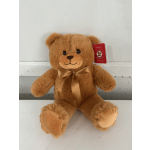 Brown teddy bear with a gold ribbon bow