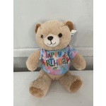 Plush teddy bear wearing a colorful Happy Birthday shirt