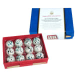 Box of speckled chocolates in a red tray with a blue lid