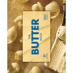 Butter book cover with cream-colored butter curls around it