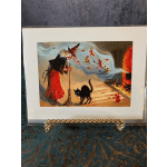 Framed Halloween card with a witch, black cat, and fireplace scene