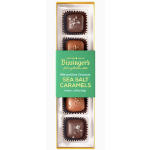 Box of sea salt caramels in a clear tray with green label