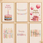 Set of birthday greeting cards with cakes, balloons, candles, and bunting