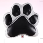 Black paw print balloon on a light background