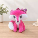 Pink and white plush fox toy with a bow