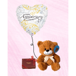 Anniversary balloon with teddy bear and chocolate box on a pink background